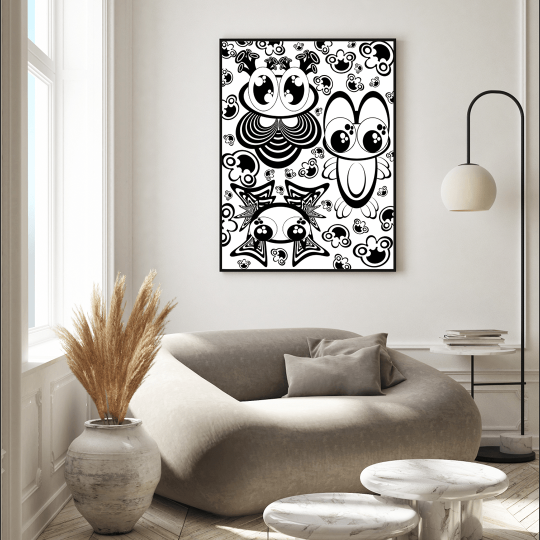 Black and white abstract artwork with various animal-like shapes on a white wall above a gray sofa, with a vase of dried plants nearby.